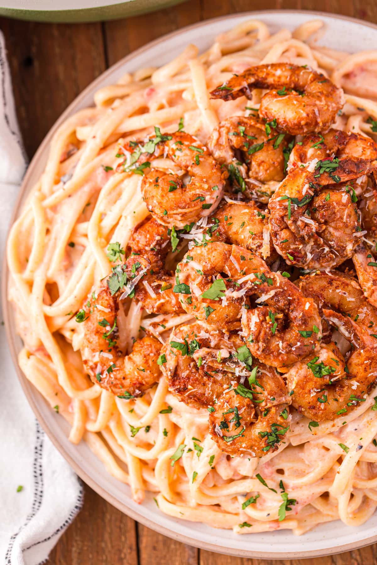 Overhead view of a plate of Cajun shrimp pasta