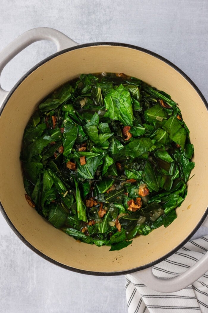 Cooked Collard Greens in a stock pot.
