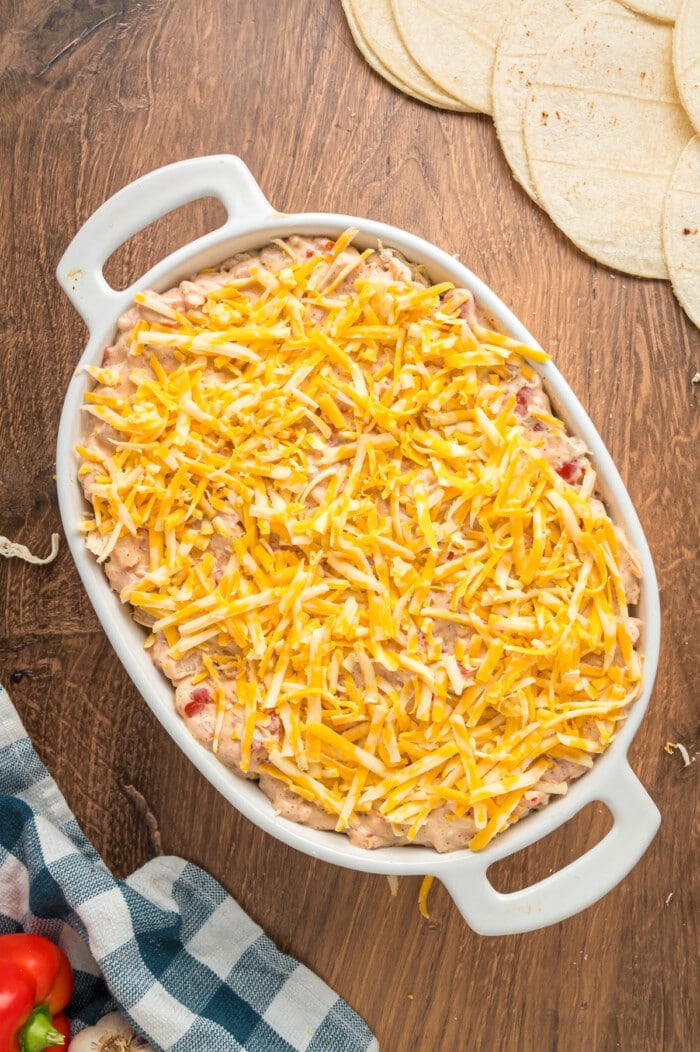 Shredded cheese topping a casserole.