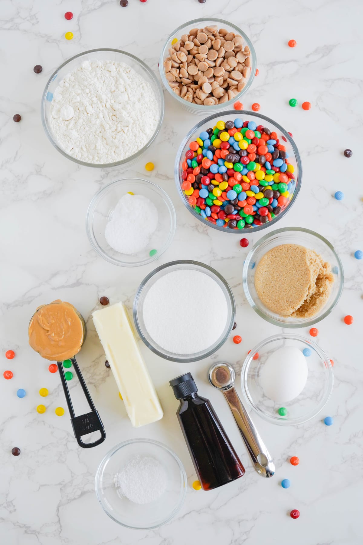 Ingredients to make peanut butter M&M cookies.
