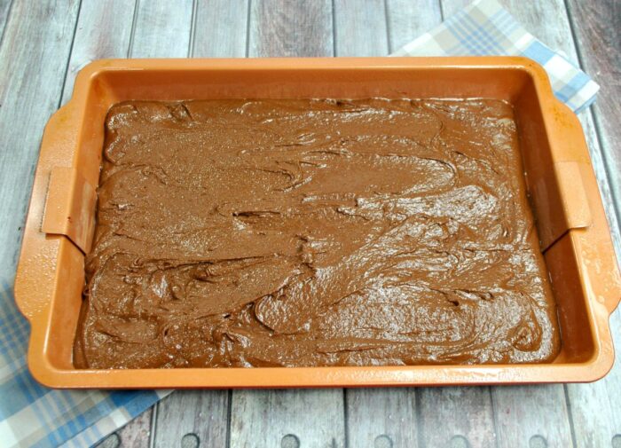 brownie batter spread in pan
