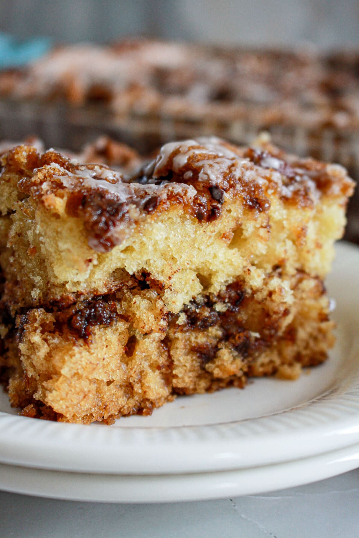 chocolate chip coffee cake on a white plate
