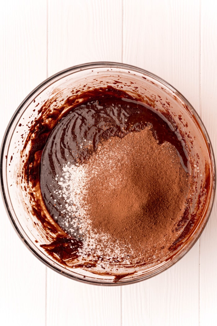 adding cocoa into brownie mix