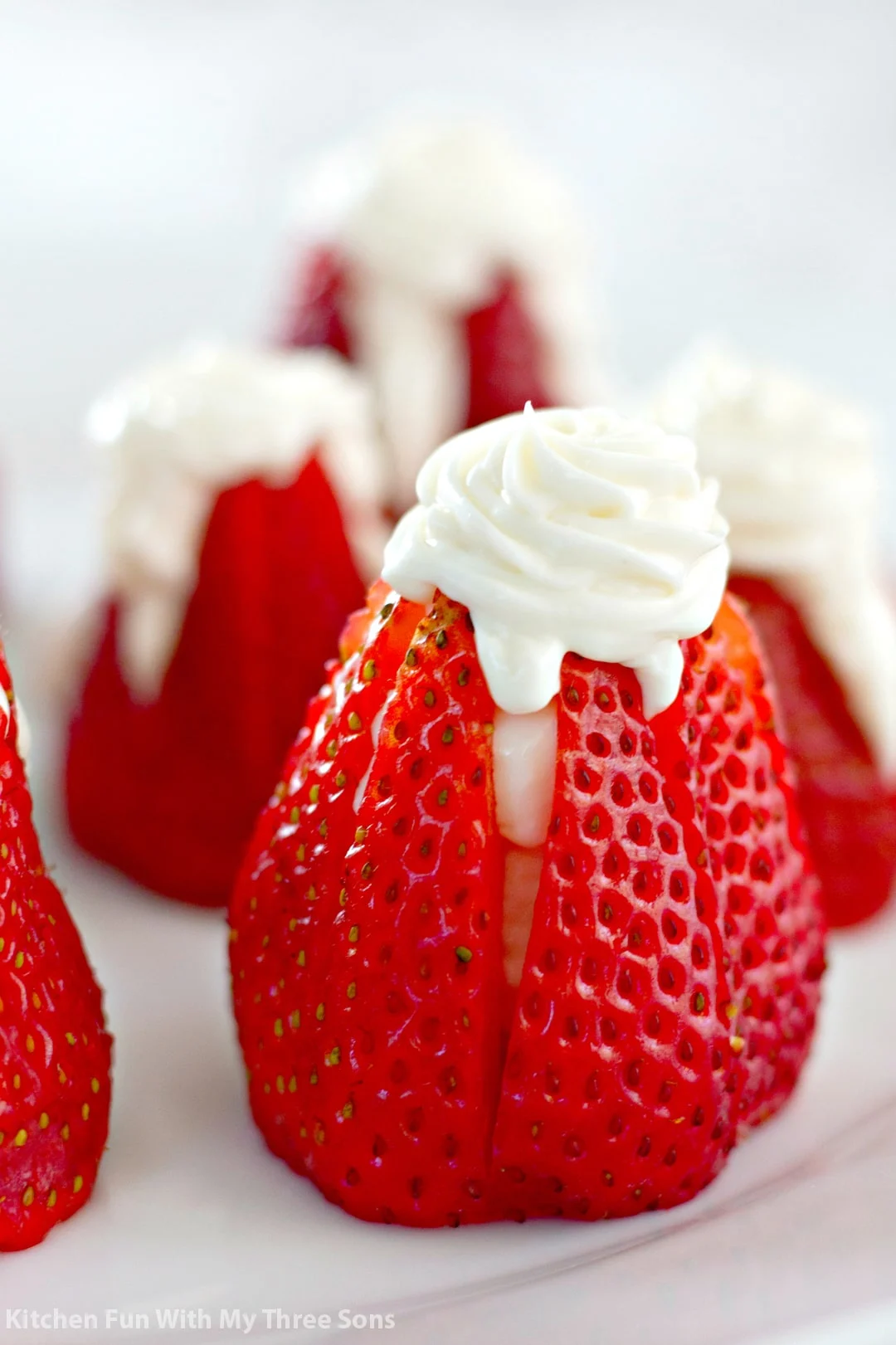 5 Ingredient Cheesecake Stuffed Strawberries on a white plate