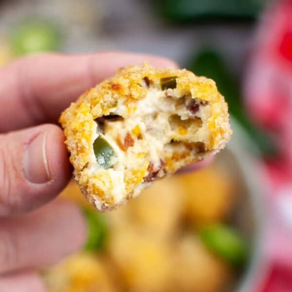 jalapeno popper bite with a bite taken out