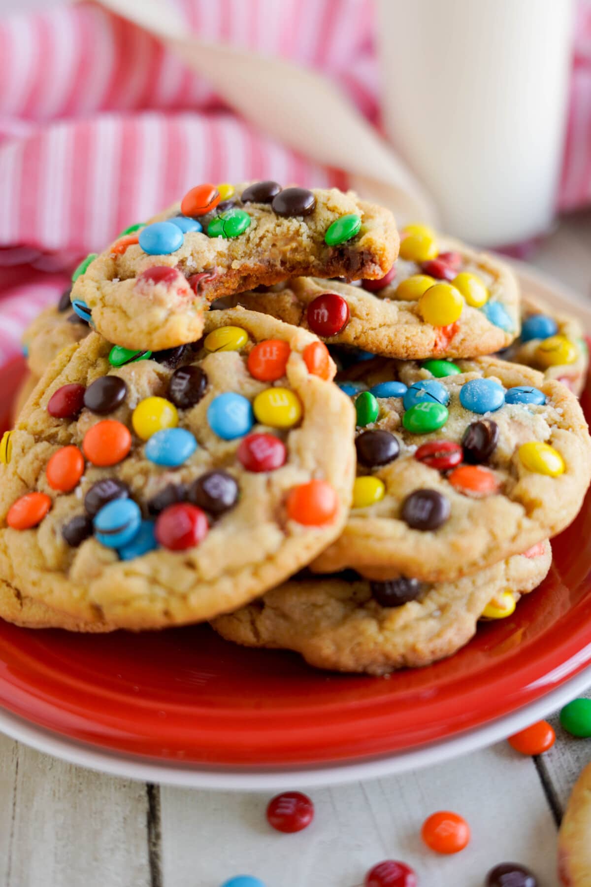 Peanut Butter M&M Cookies stacked on a plate