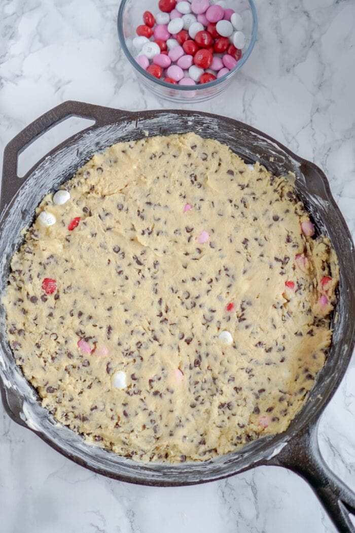 cookie batter pressed into a skillet