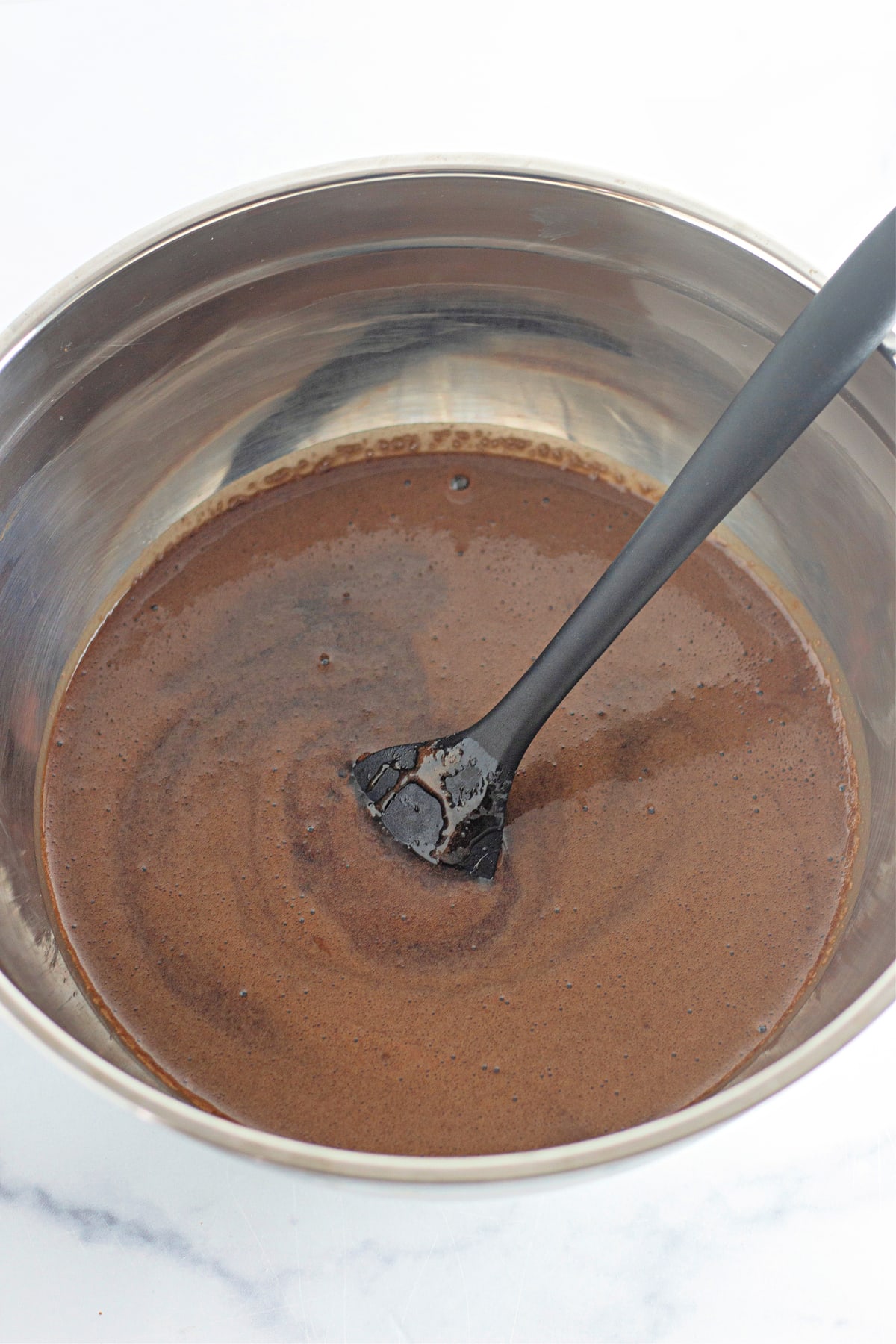 wet ingredients mixed together for chocolate cupcakes