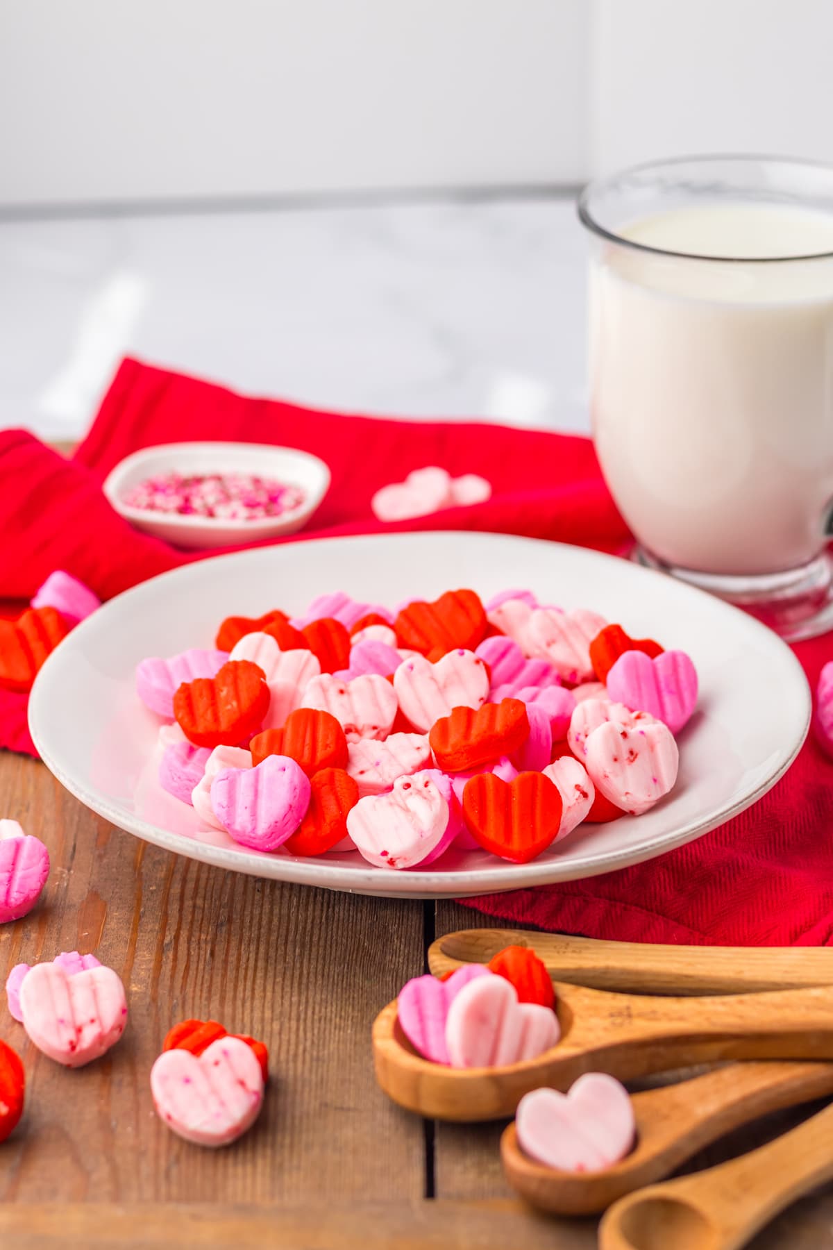 heart shaped cream cheese candy in white bowl