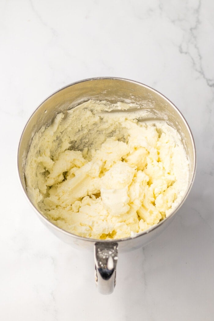 cream cheese and butter mixed in bowl