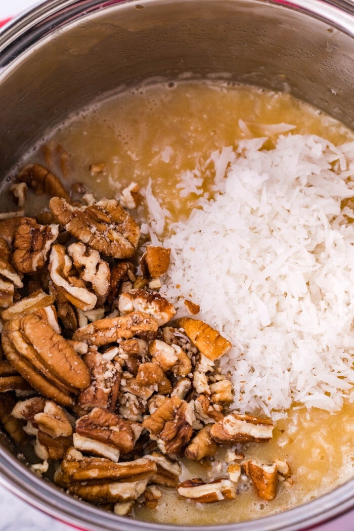 Pecans and shredded coconut added to the pot