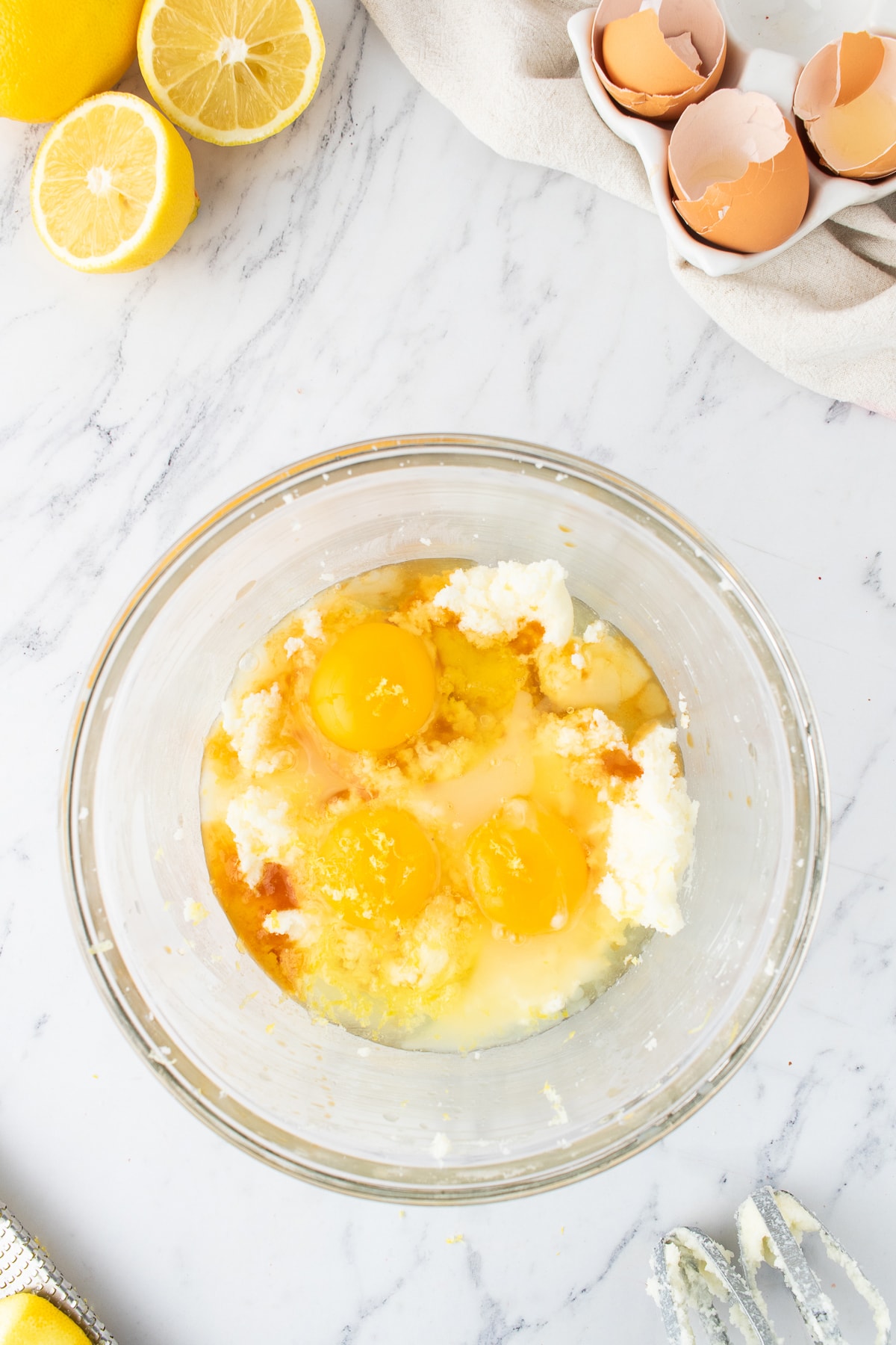 eggs in mixing bowl with lemon pound cake batter
