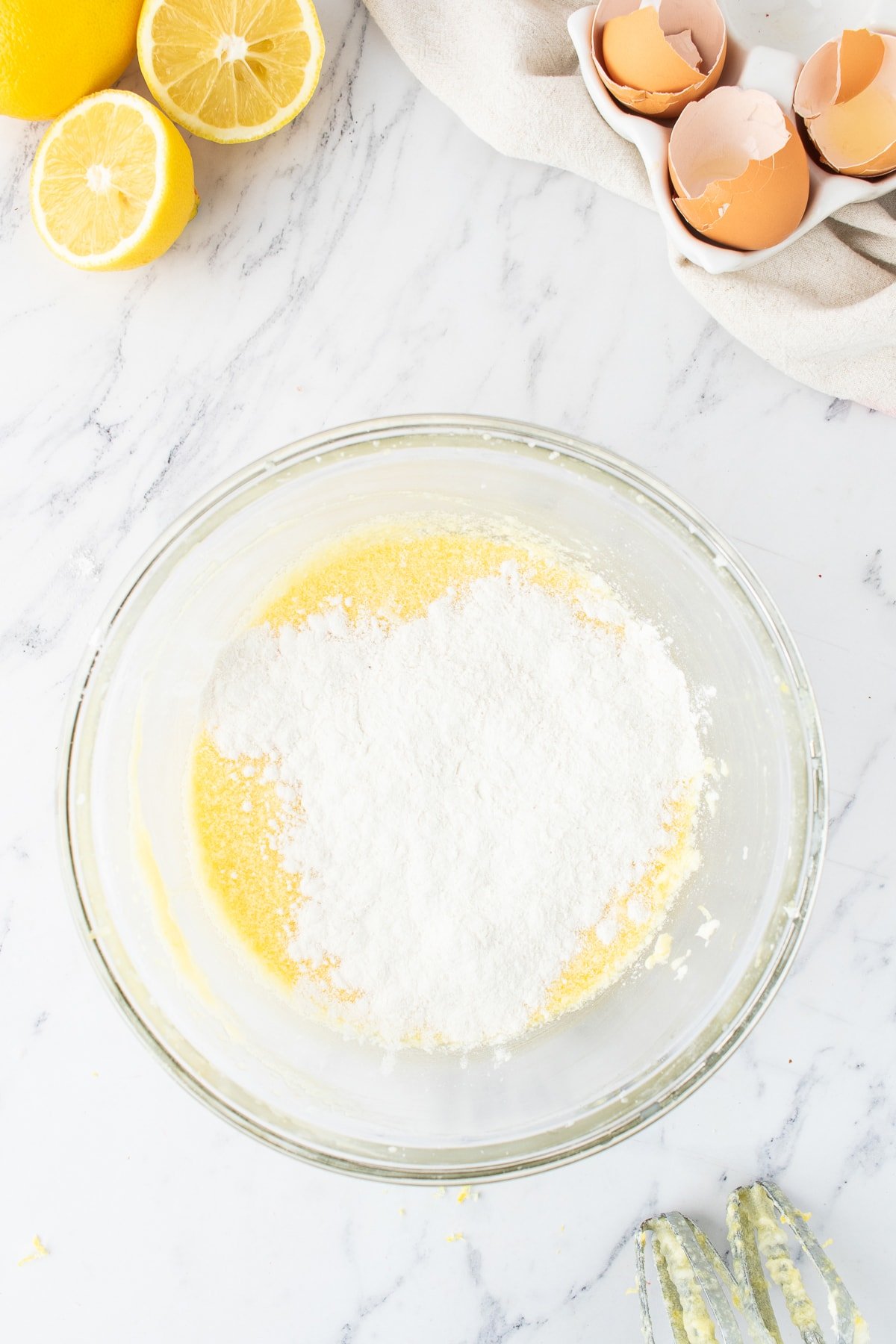 flour added to mixing bowl for lemon pound cake