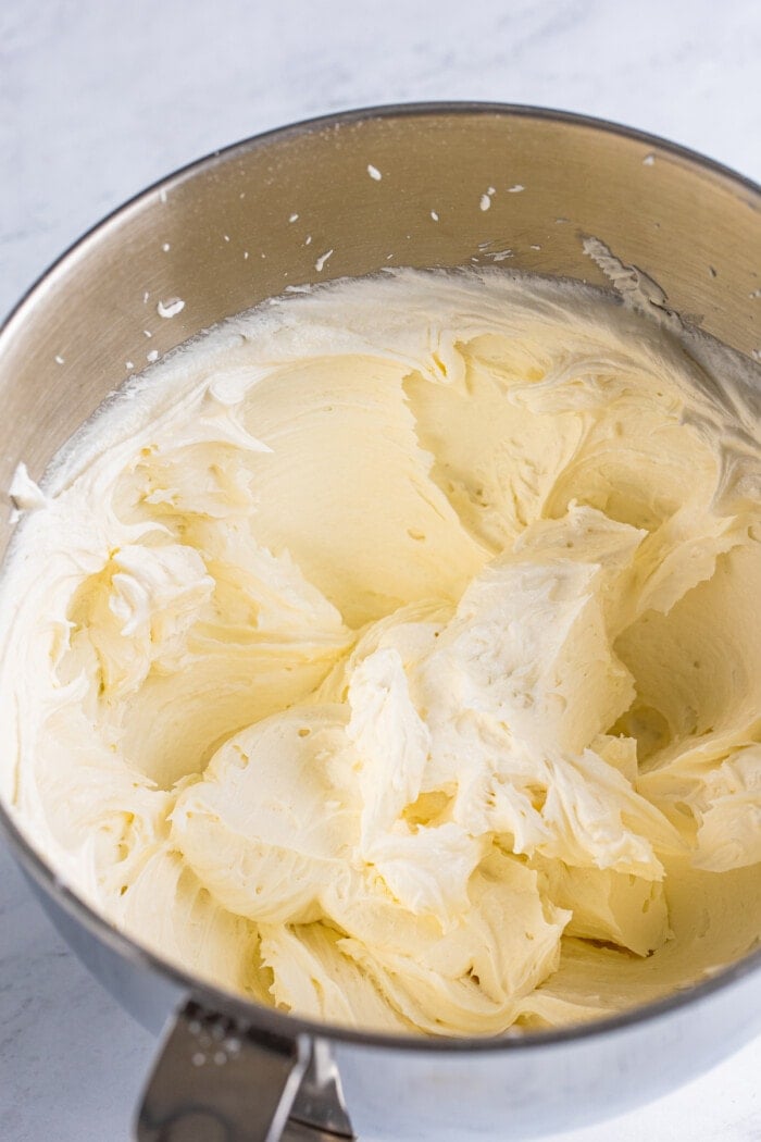 White Frosting in a mixing bowl.