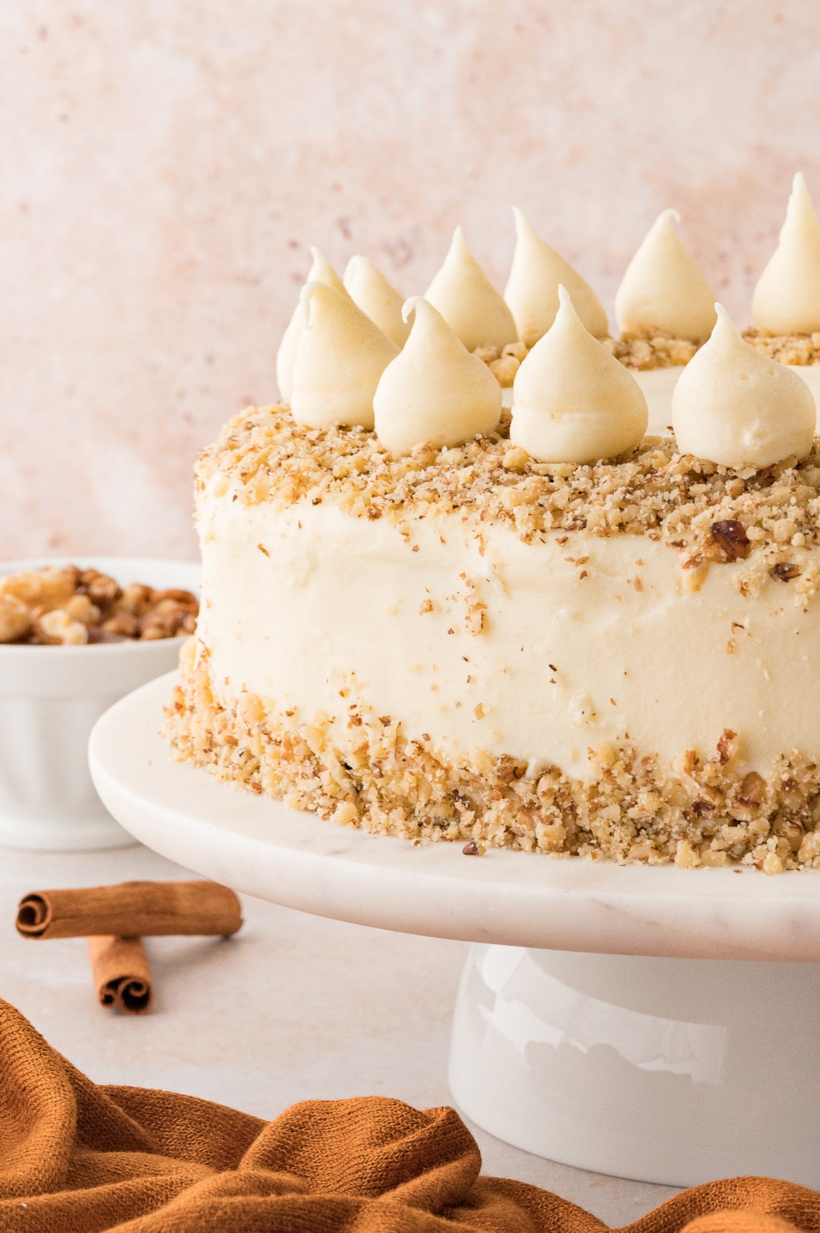 The best carrot cake on a cake pedestal