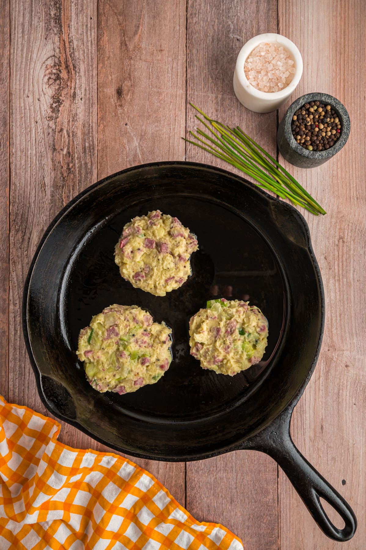 colcannon cakes in cast iron pan