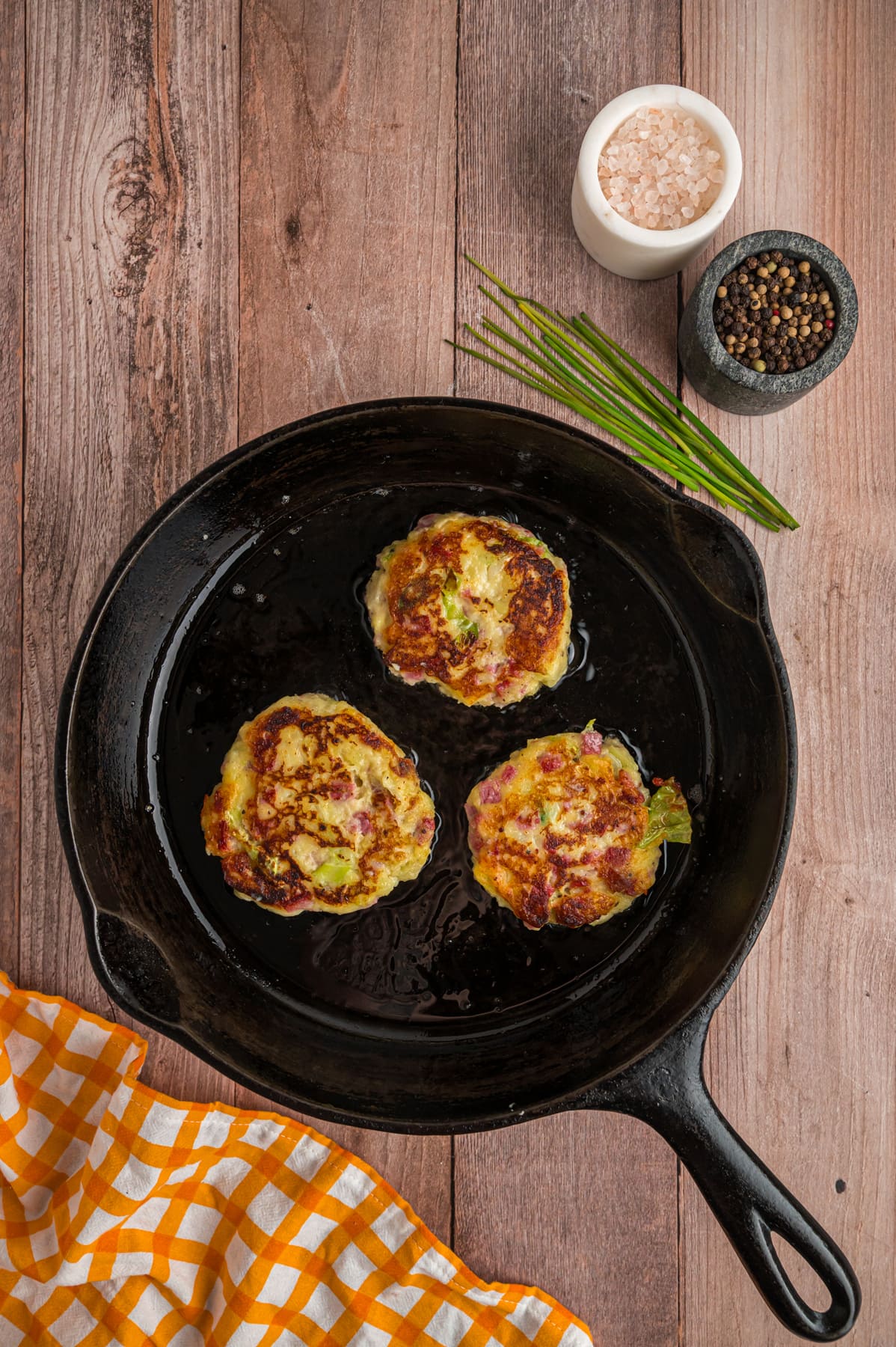 colcannon cakes cooked in cast iron pan