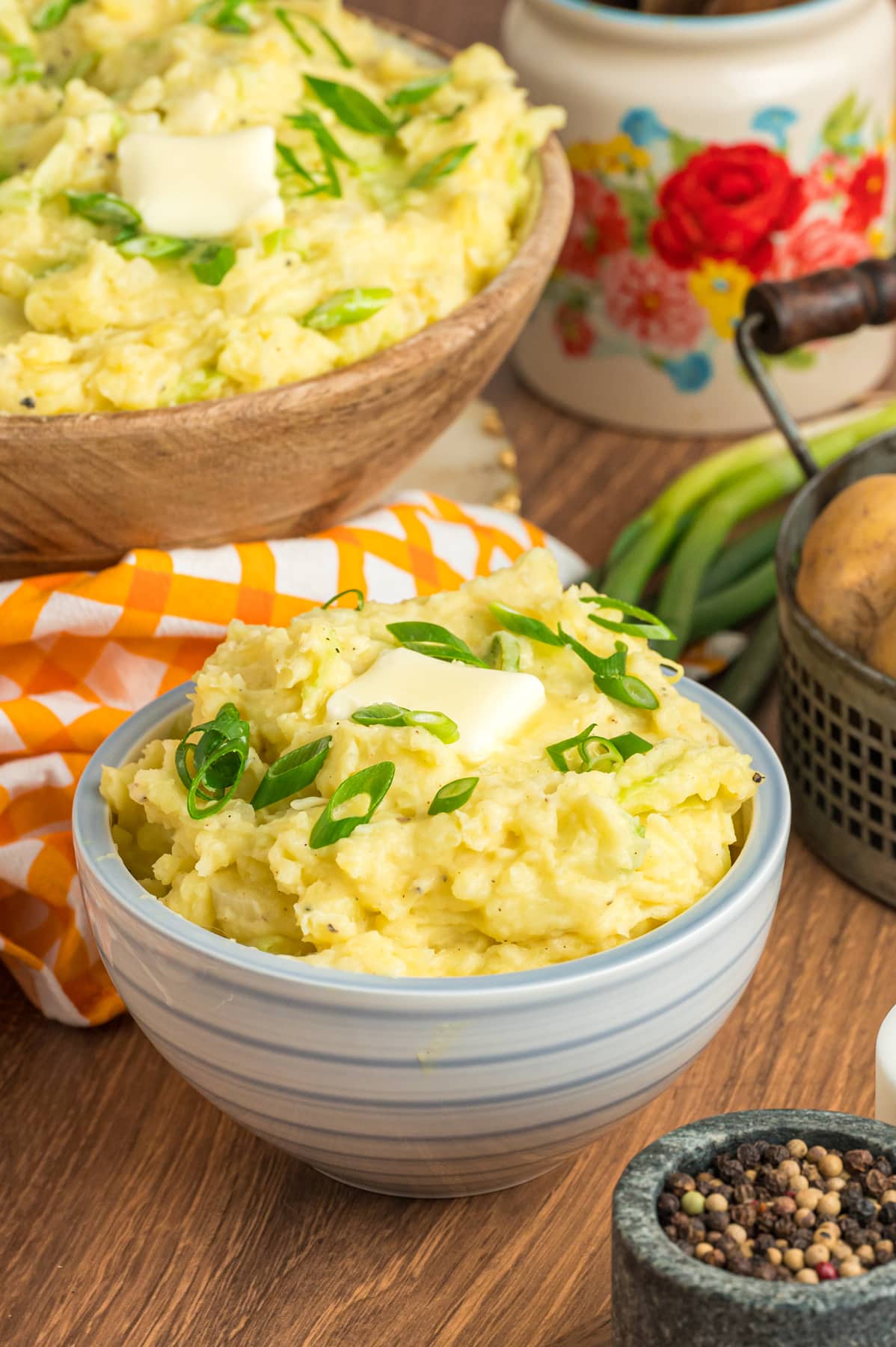 bowl of colcannon with butter and green onions