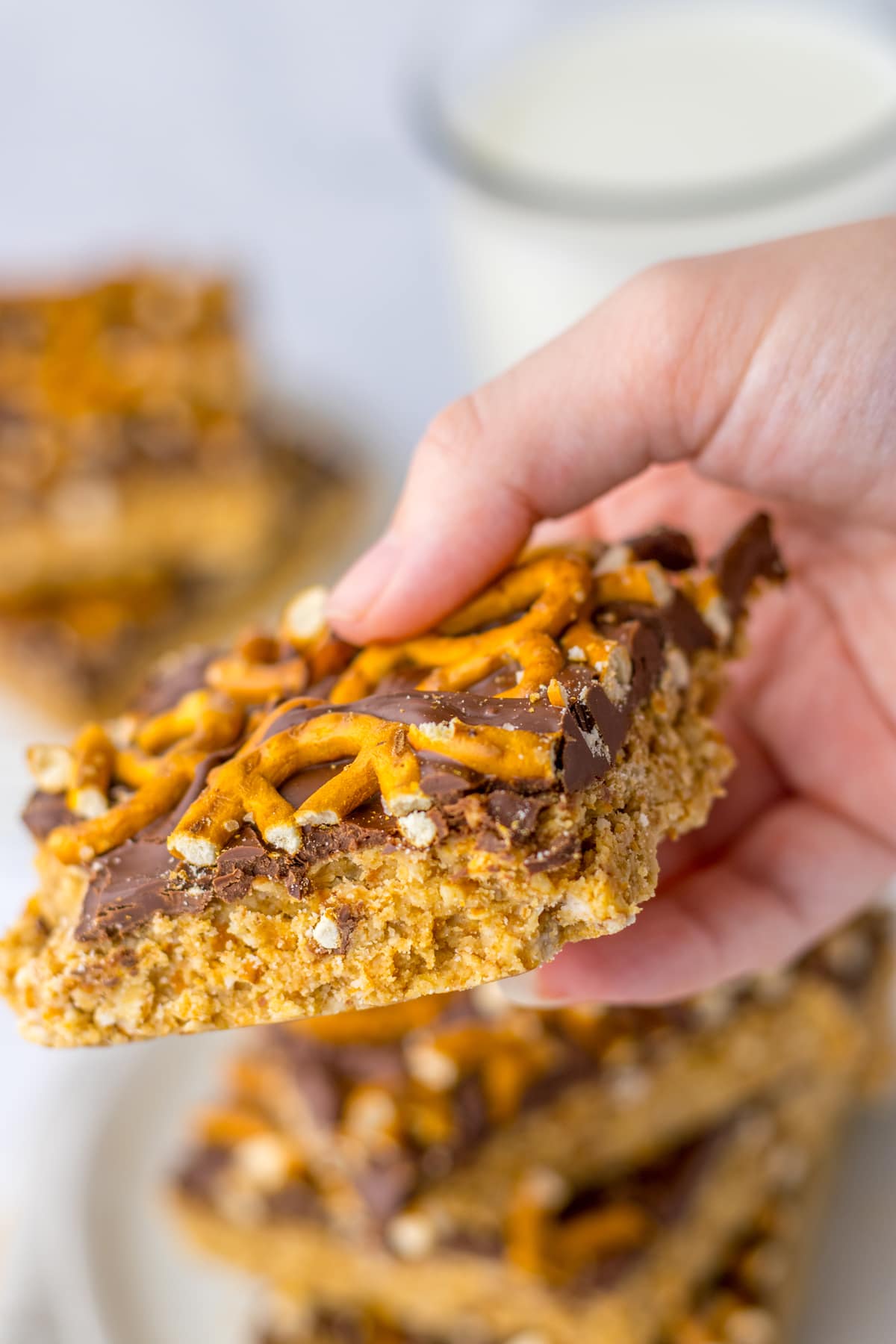 hand holding Peanut Butter Pretzel Bars