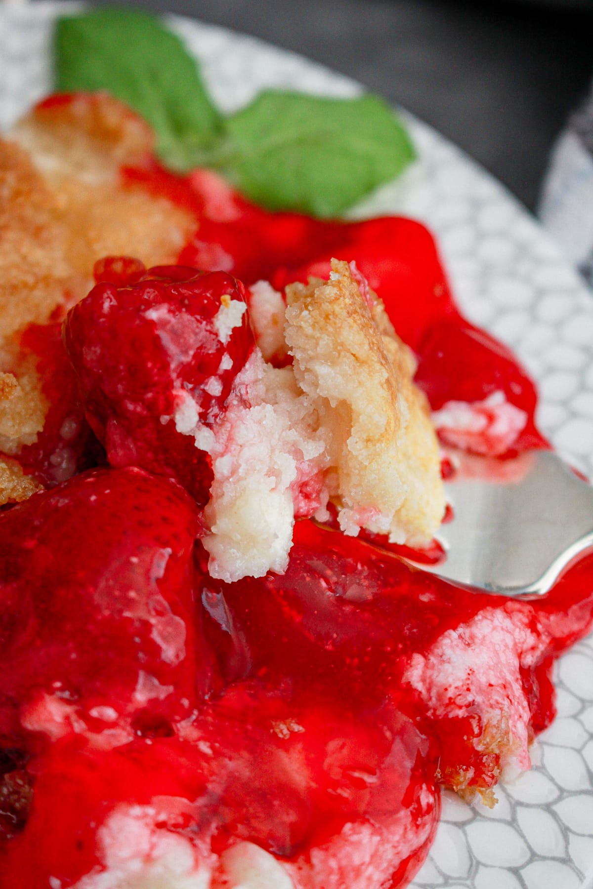 strawberry dump cake with fork