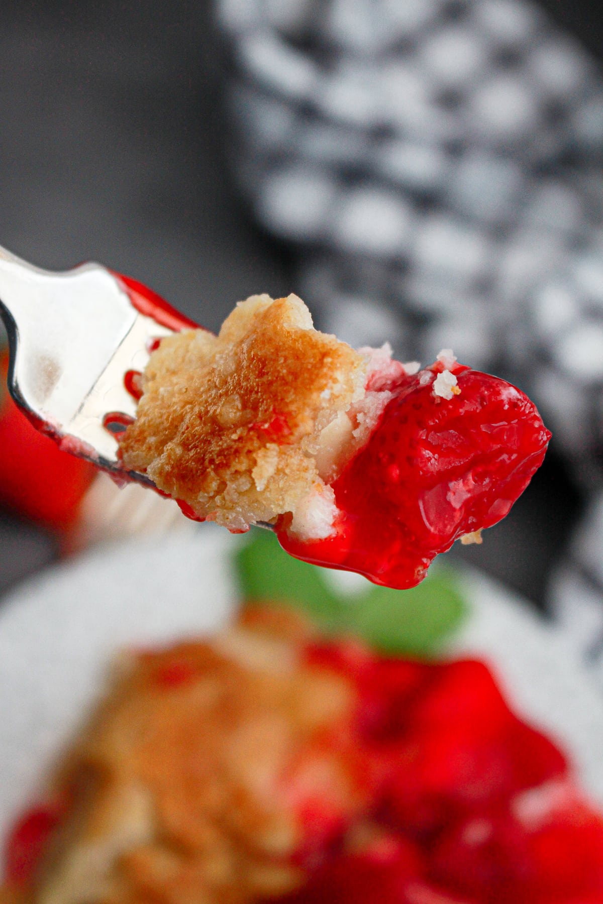 fork with strawberry dump cake