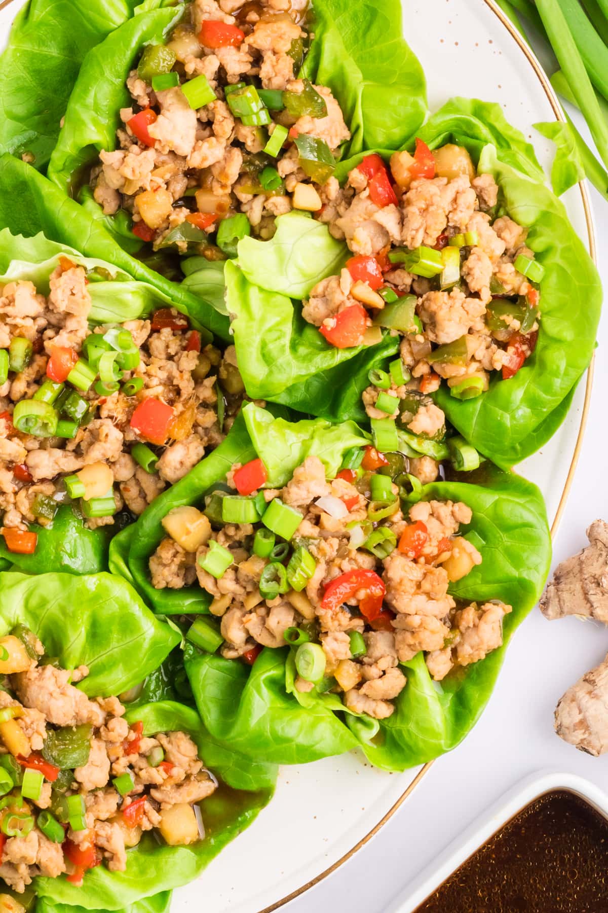 Overhead view of chicken lettuce wraps on a plate