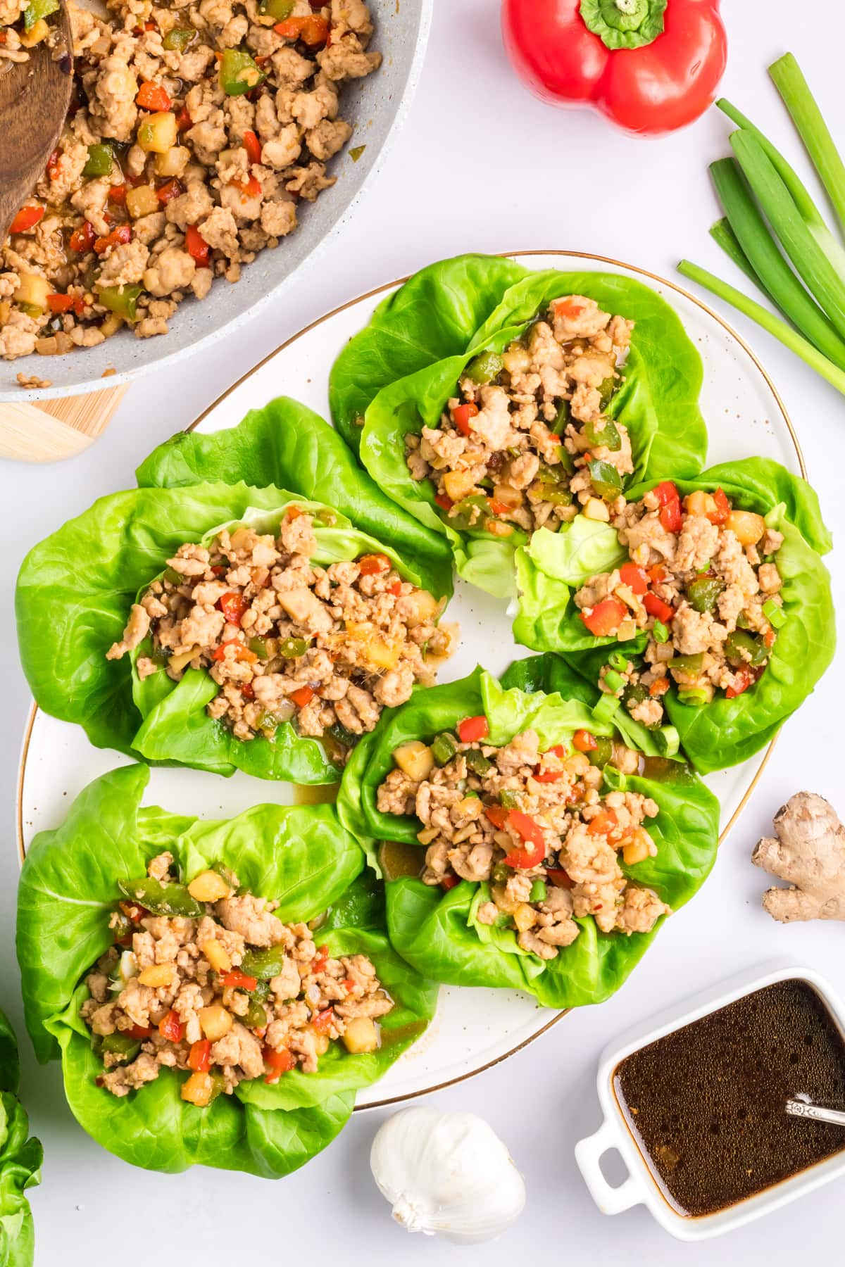 Overhead view of chicken lettuce wraps on a plate