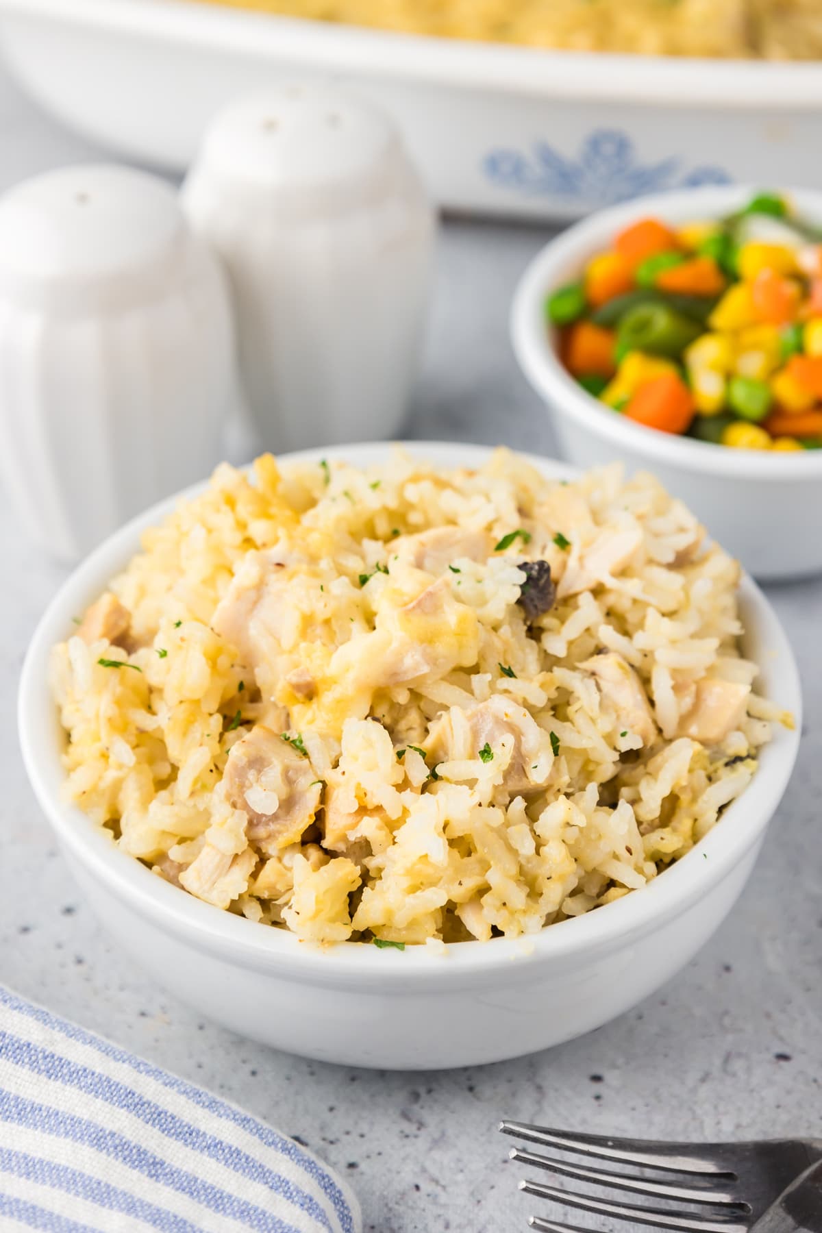 chicken and rice casserole in white bowl
