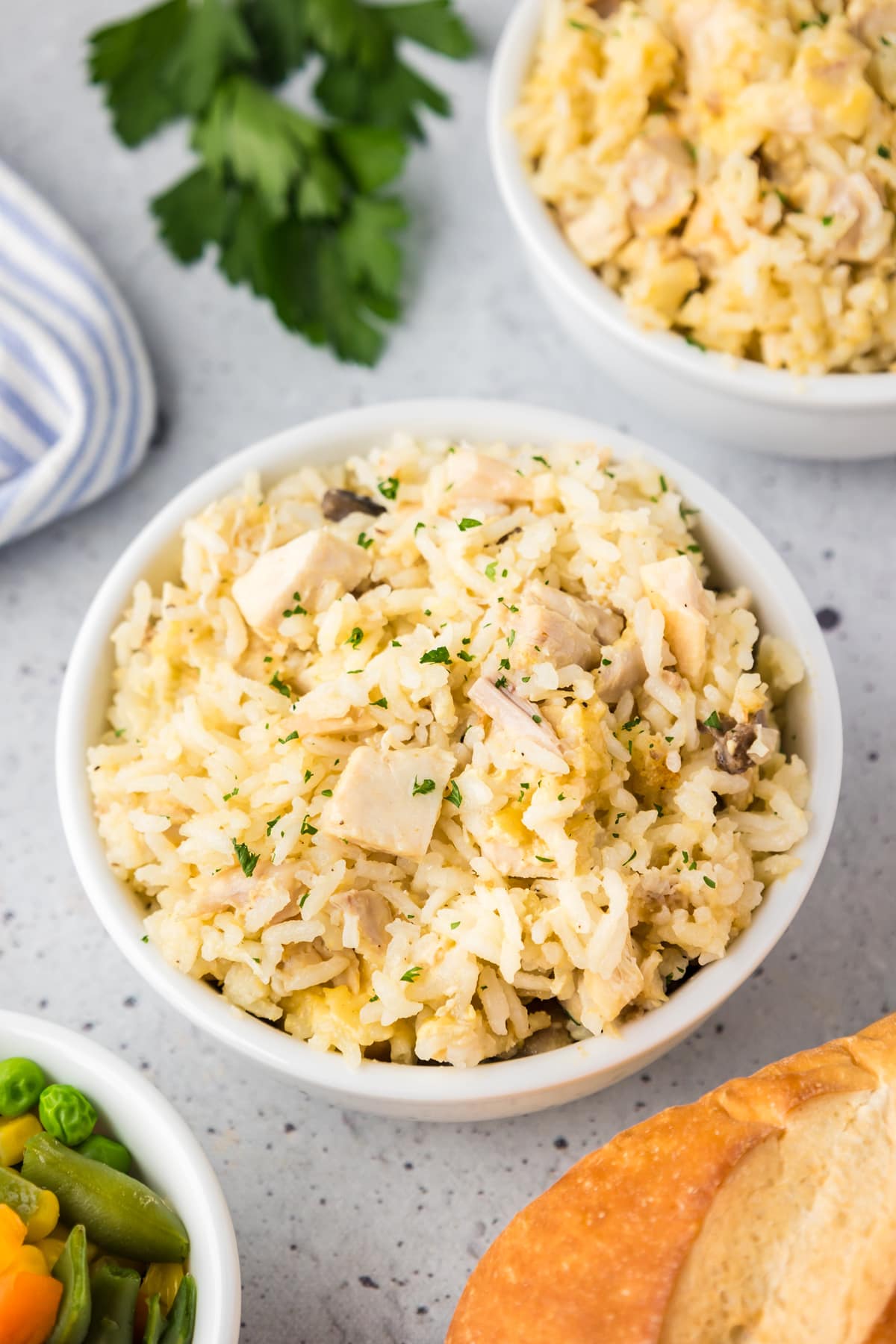 chicken and rice casserole in white serving bowl