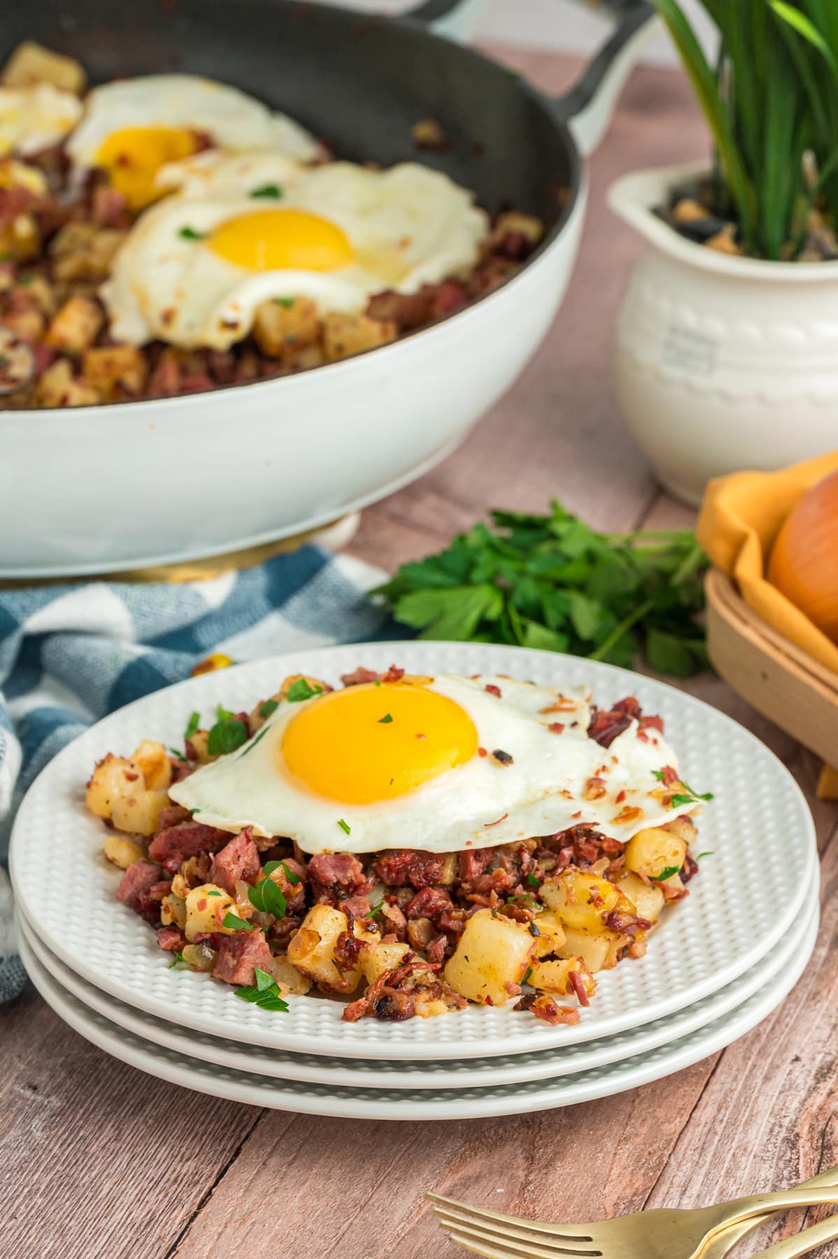 A serving of Corned Beef Hash on a white plate.
