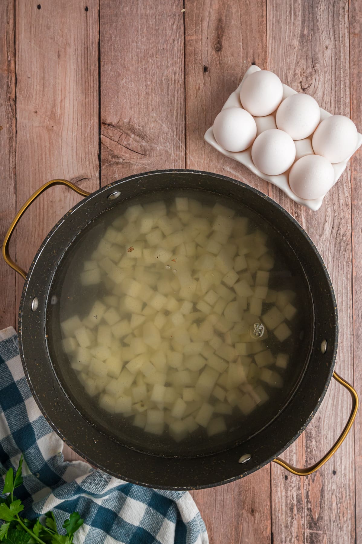 Diced potatoes in a cooking pot.