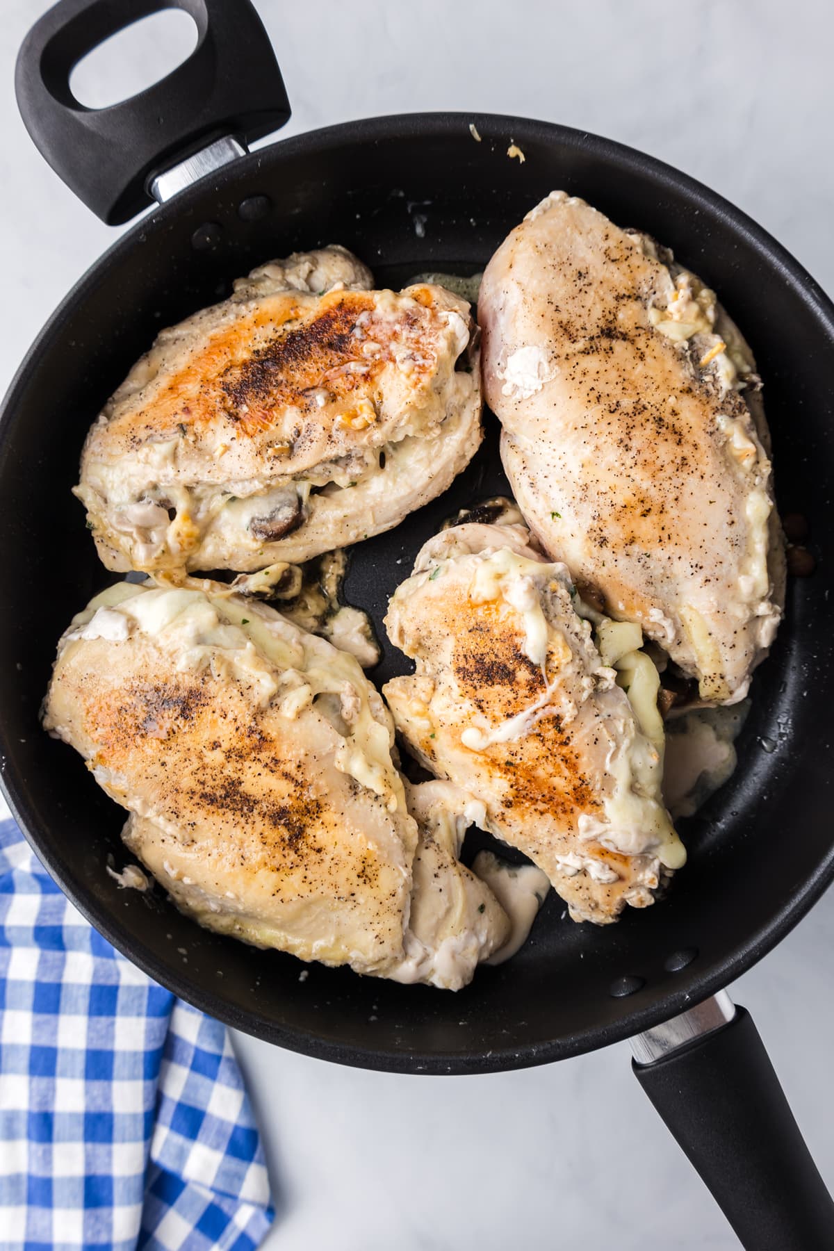 mushroom stuffed chicken cooked in pan