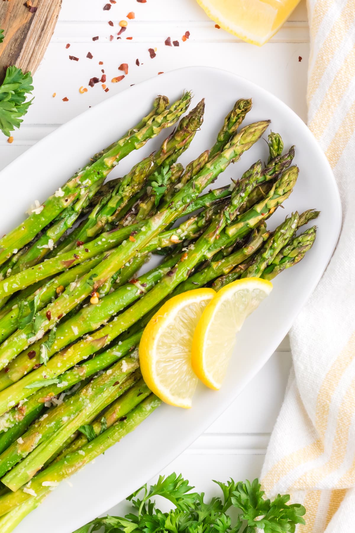 Overhead view of roasted asparagus on a palte
