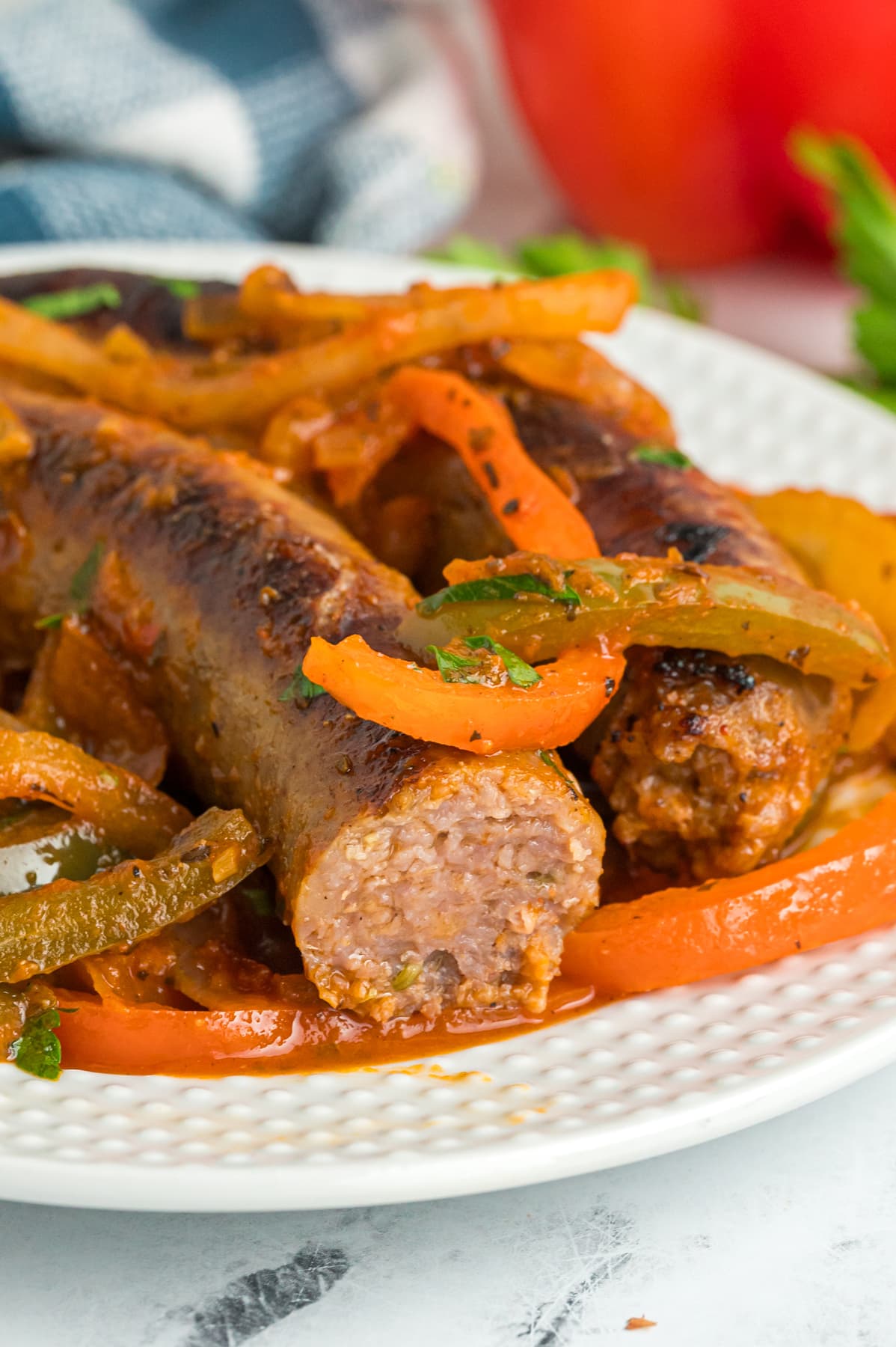 A plate of Italian sausage and peppers