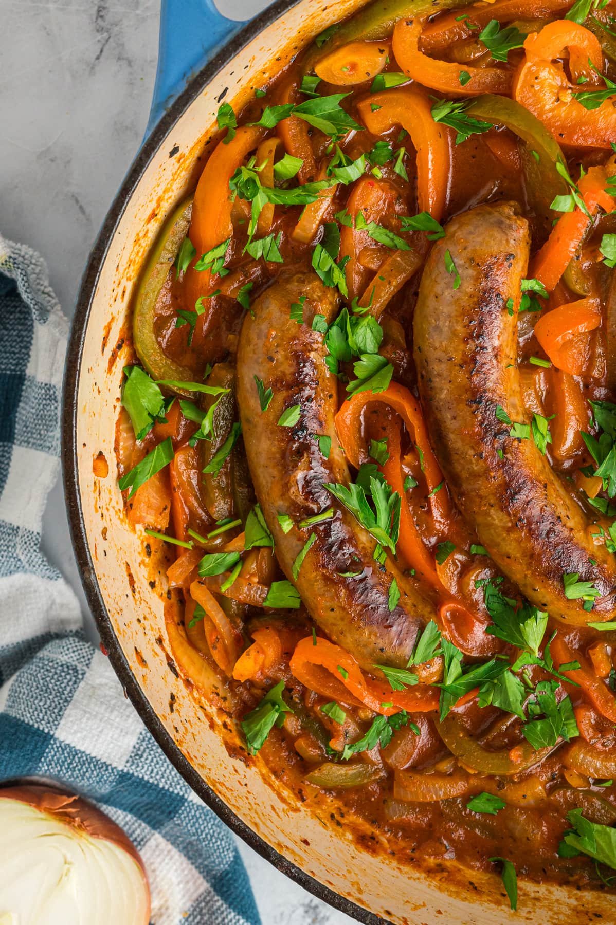 Overhead view of Italian Sausage and peppers in a pan