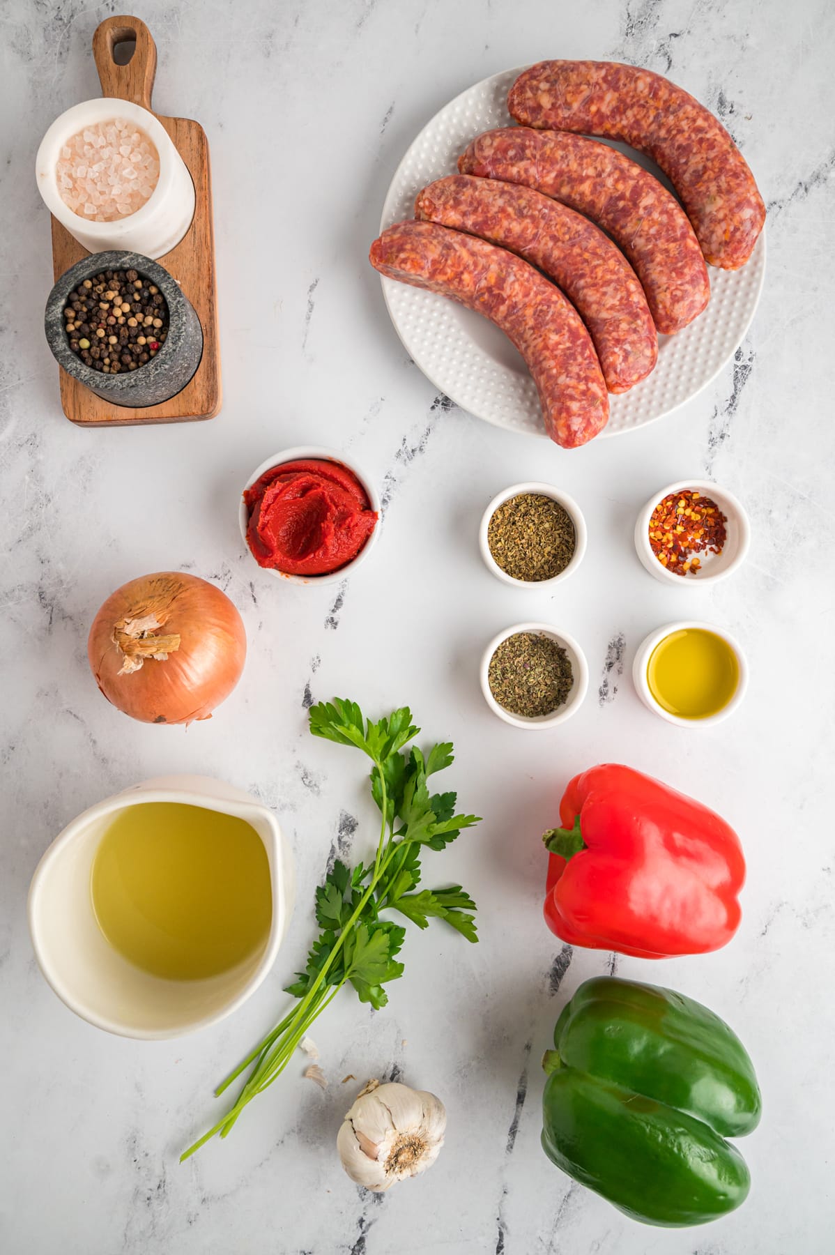 Overhead view of sausage and peppers ingredients