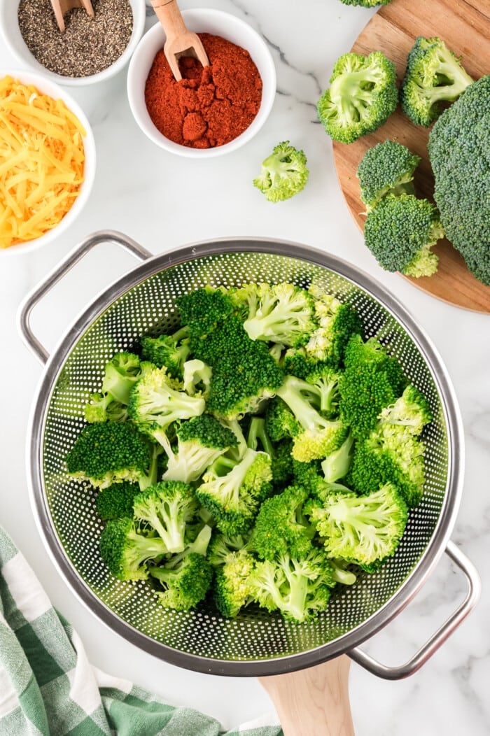 Steamed broccoli in a strainer