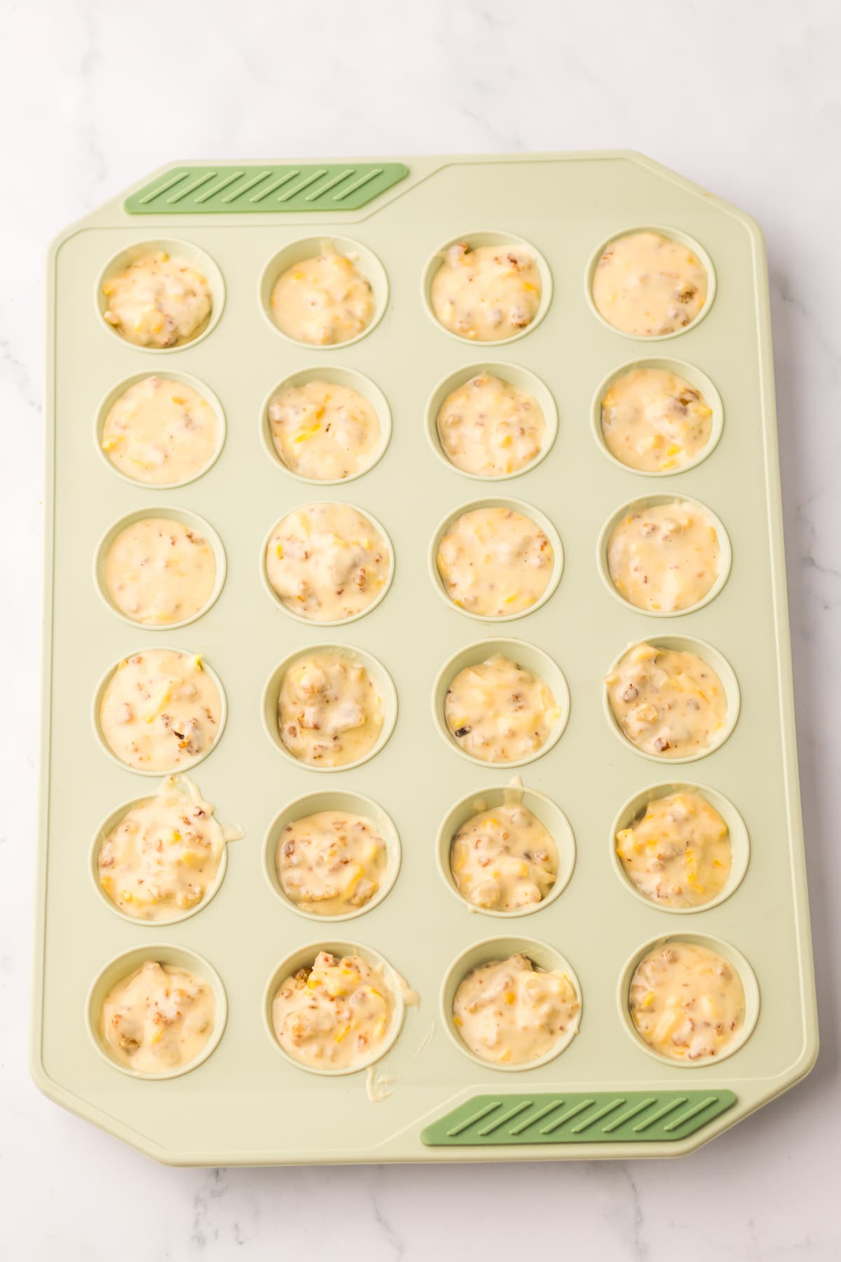 McGriddle Bites in muffin pan ready for oven