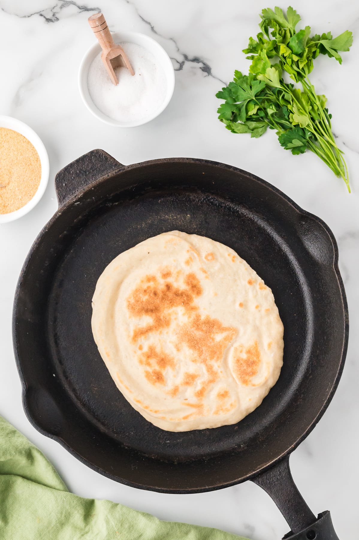Naan Bread cooked in cast iron skillet