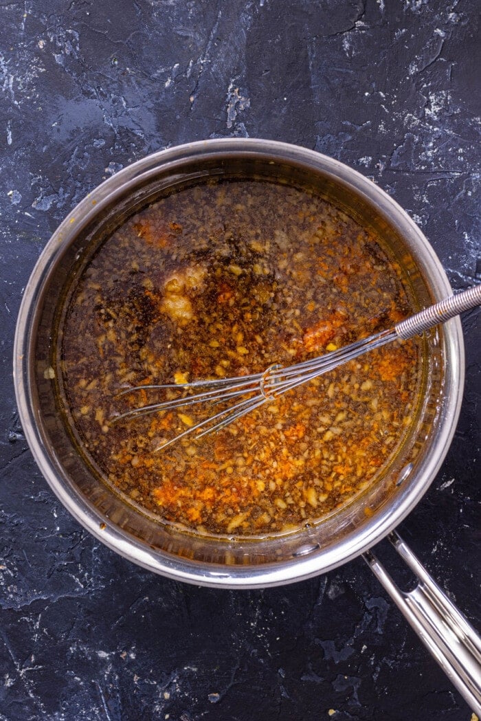 Orange chicken sauce in a saucepan