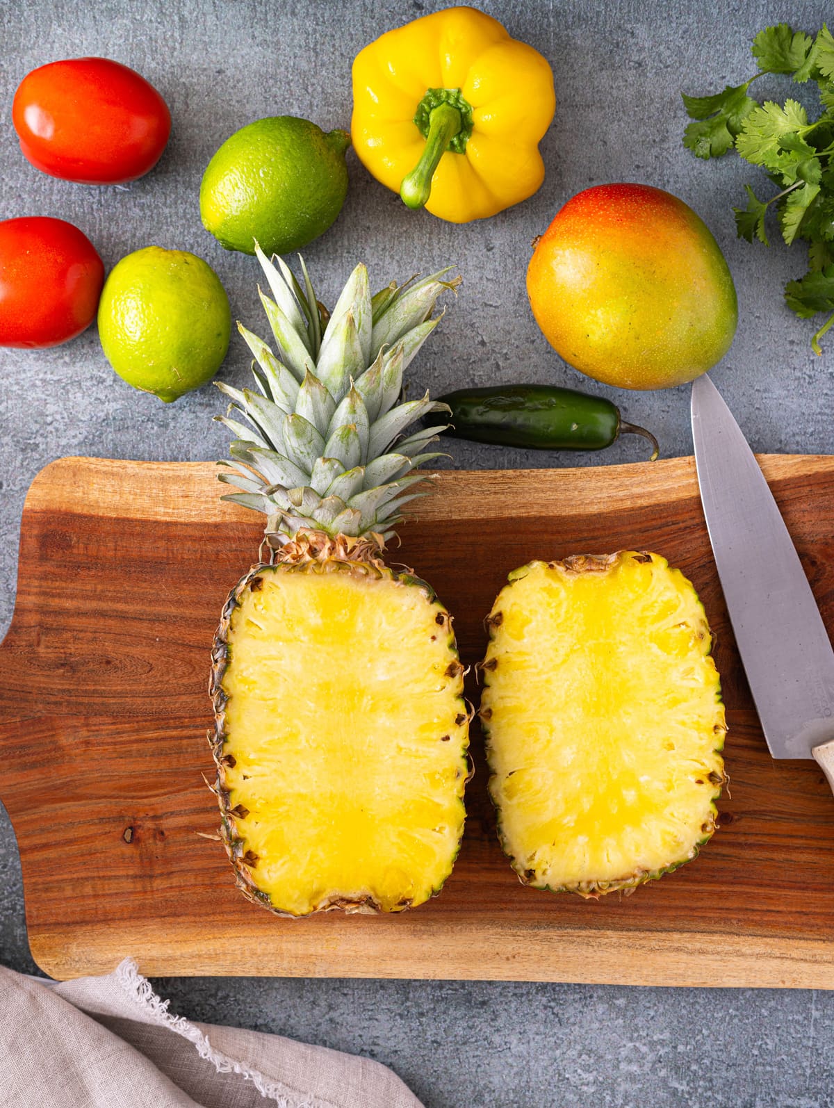 pineapple cut in half for Pineapple Salsa