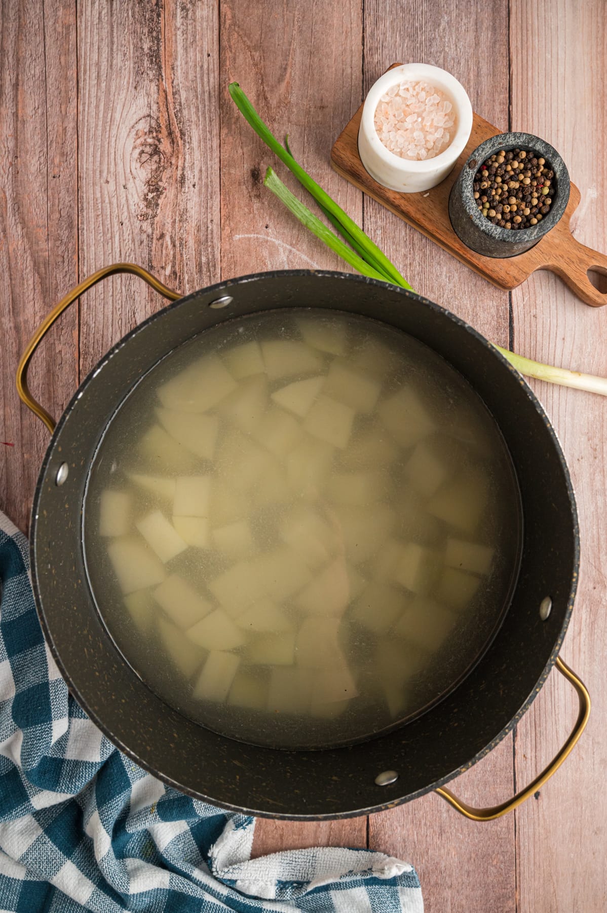 potatoes in water in pan