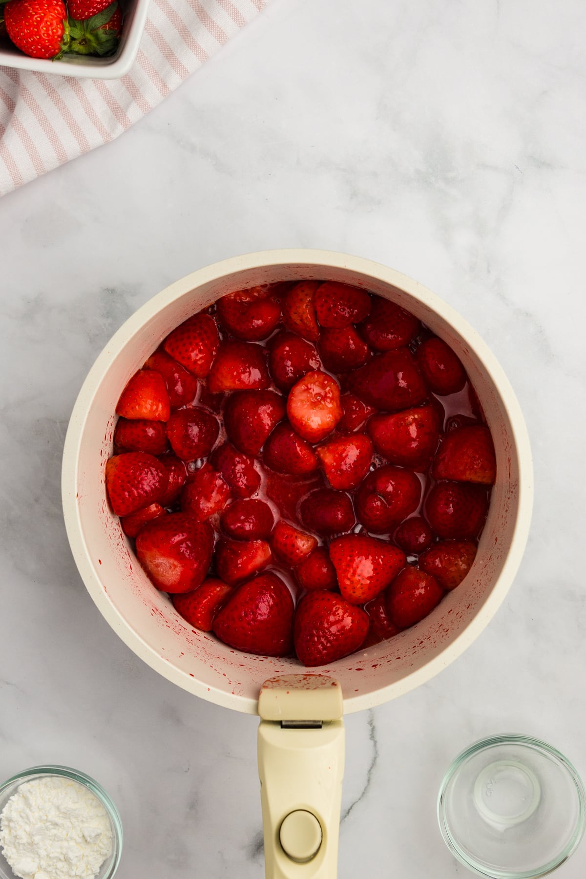 strawberries in saucepan for filling 