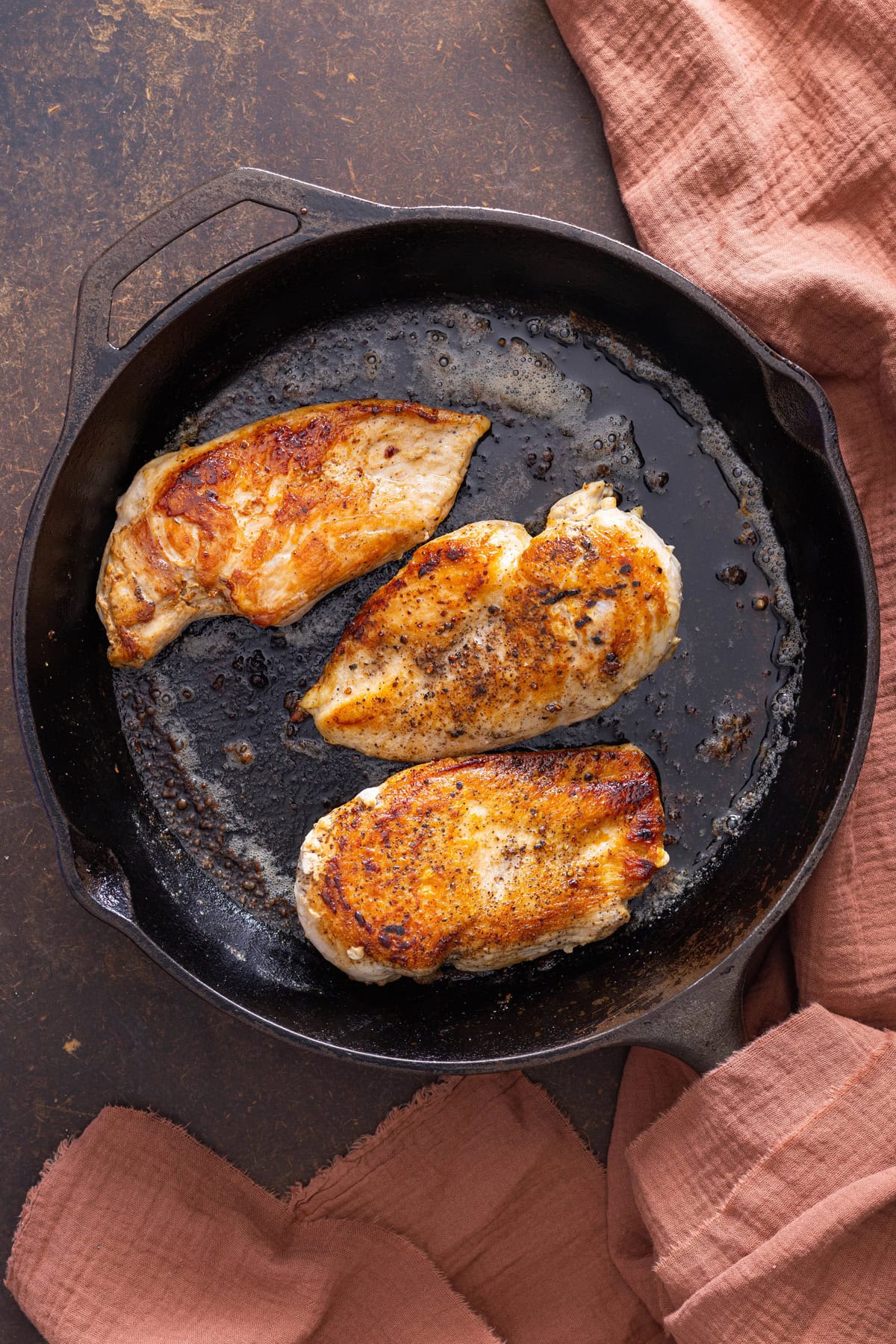 chicken cooked in cast iron skillet