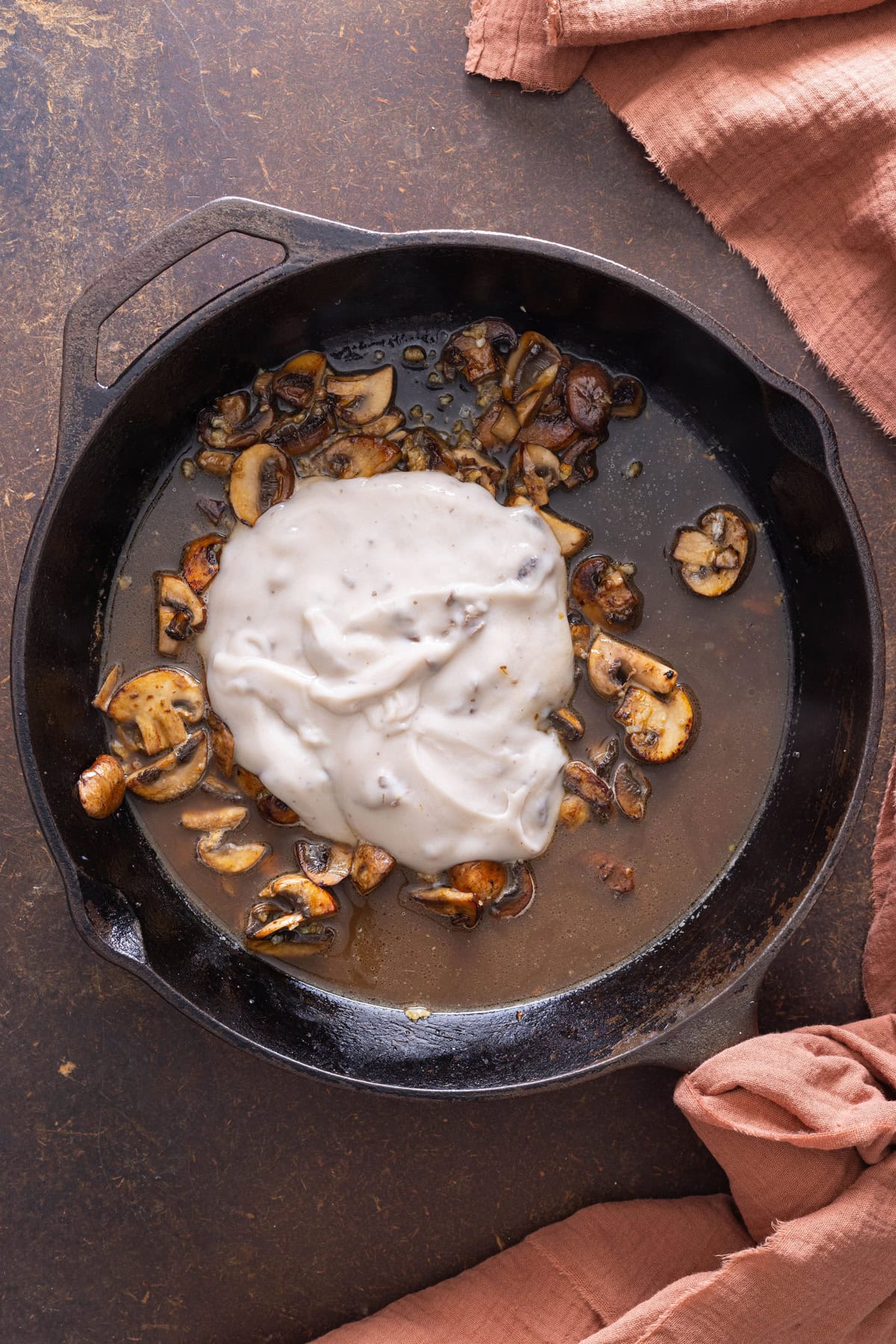 mushrooms with cream of mushroom soup in cast iron skillet