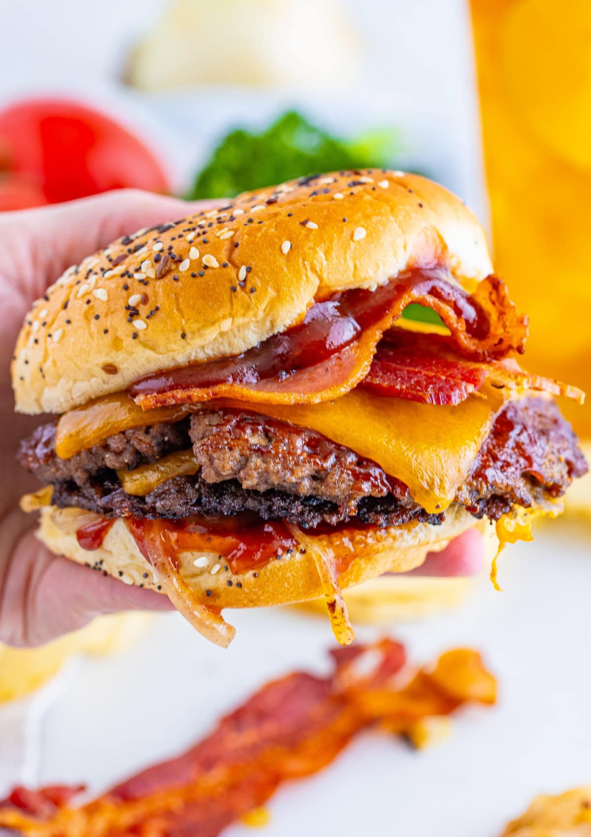 hand holding a Smash Burger