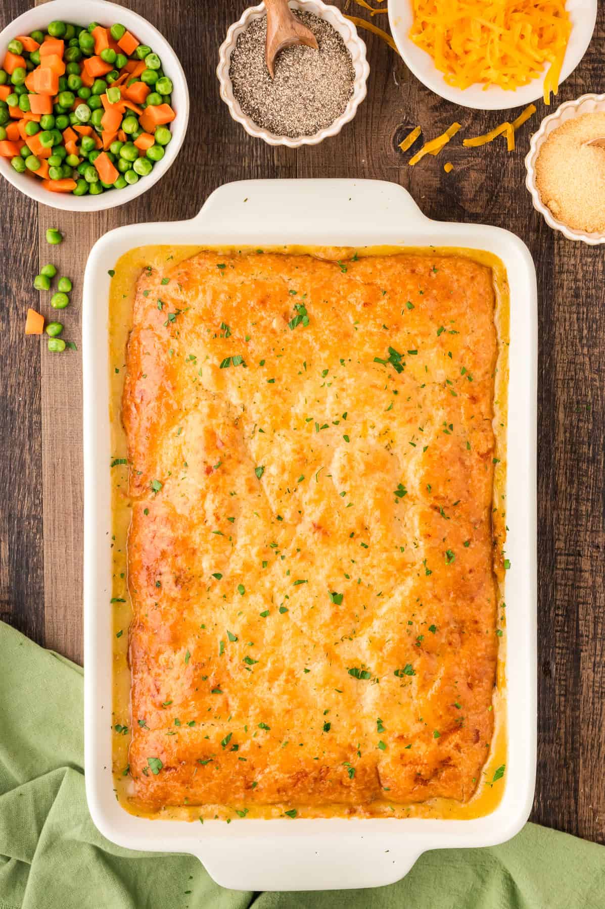 Overhead view of chicken cobbler in a casserole dish