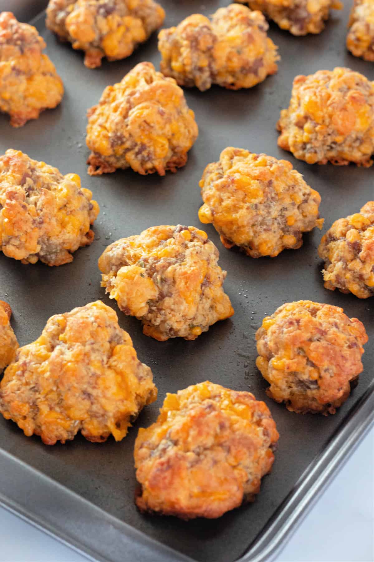 Sausage Balls on a baking sheet, fresh from the oven.