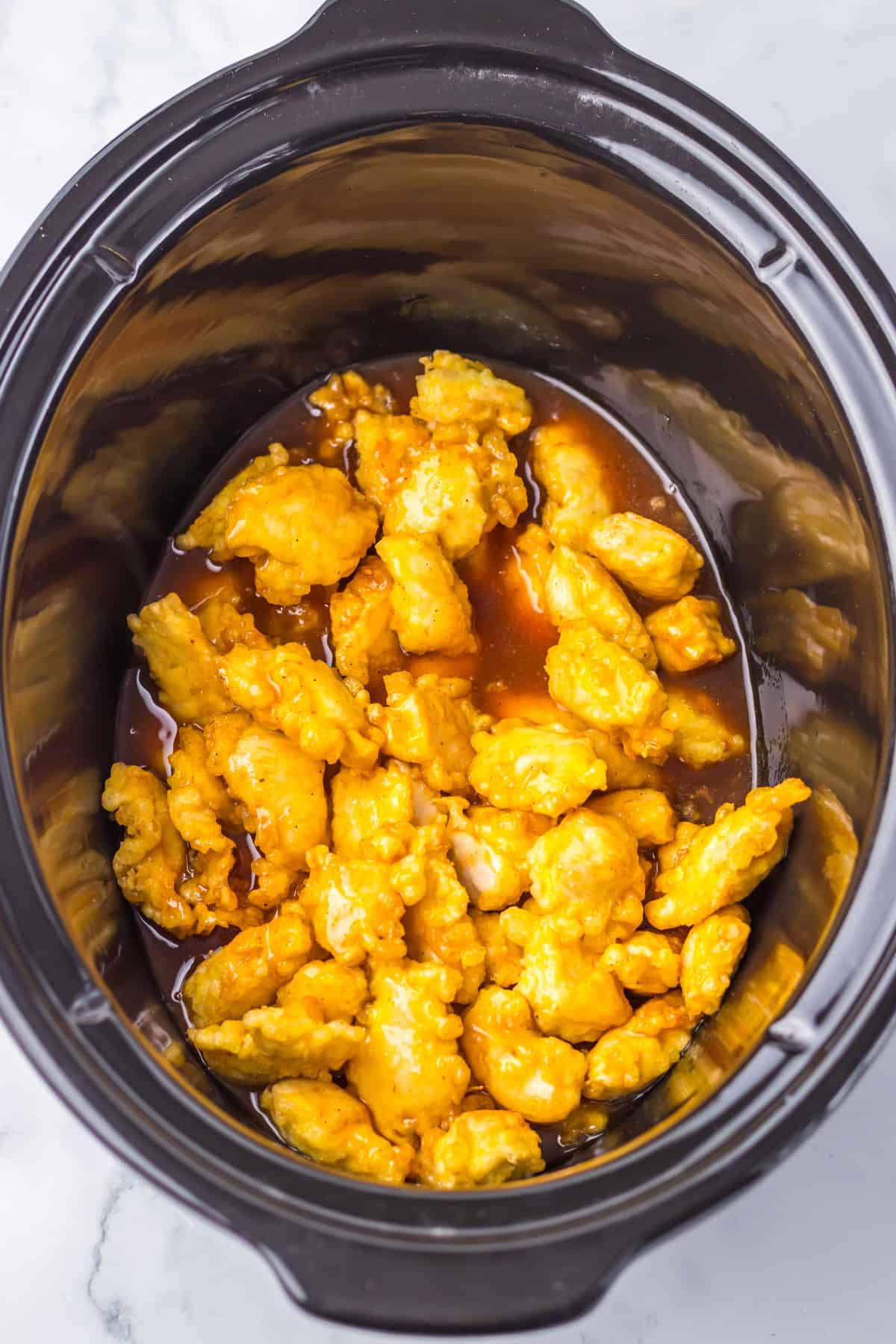 chicken in slow cooker with sauce