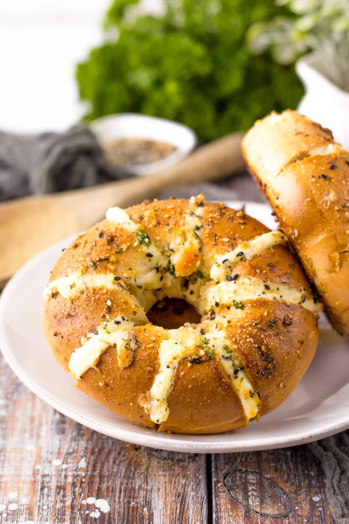 stuffed bagels with cream cheese on white plate